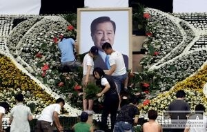 Kim ong-il a Obama smtia za zosnulm Kimom T-dungom  