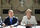 Merkelová a Medvedev vzdali česť zavraždenej aktivistke