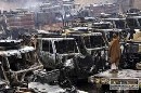 Militanti podpálili asi sto vozidiel NATO