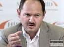 Za zmenou zákona v štátnej správe vidí Simon možnosť vypísať miliónový tender
