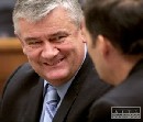 SNS sa Dostálovi vyhráža súdmi za vetu o Slotovom pití